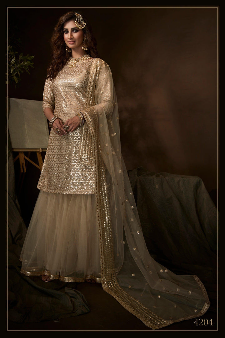 Reception Wear Dusky Beige Net Designer Sharara Suit - Fashion Nation