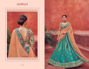 Stylish Kimora KIM6002 Bridal Turquoise Blue Peach Jacquard Silk Lehenga Choli - Fashion Nation